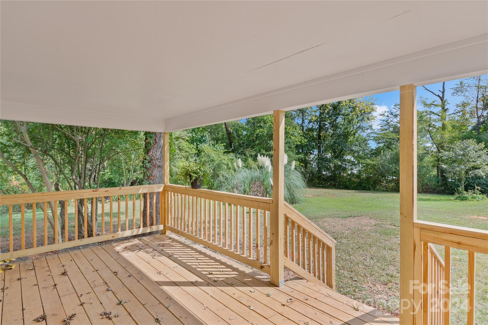 22 Potter Street Mill Spring, NC 28756 - Photo 4 of 15 a view of a wooden deck