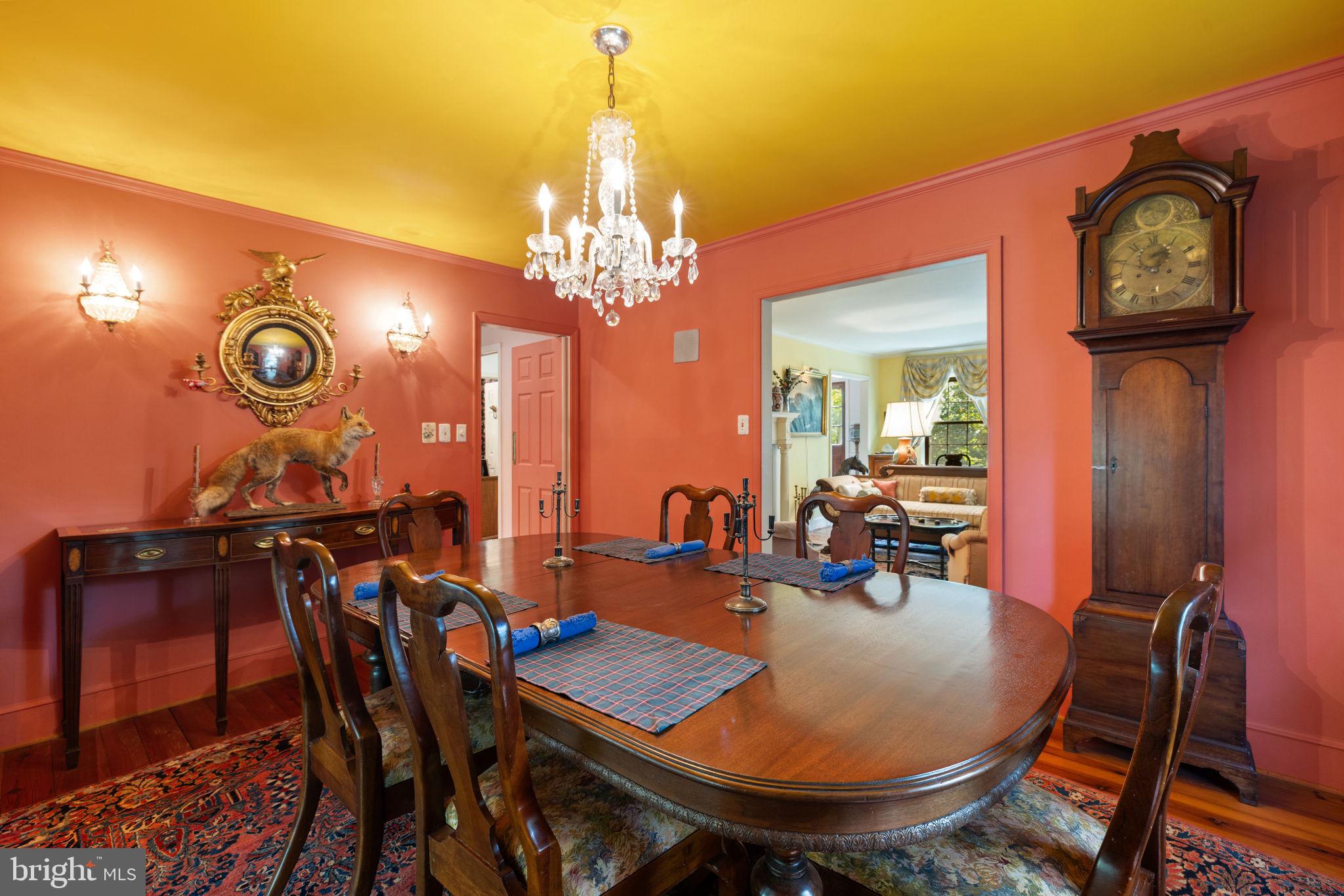 961 Summerville Road Boyce, VA 22620 - Photo 15 of 57 a view of a dining room with furniture and chandelier