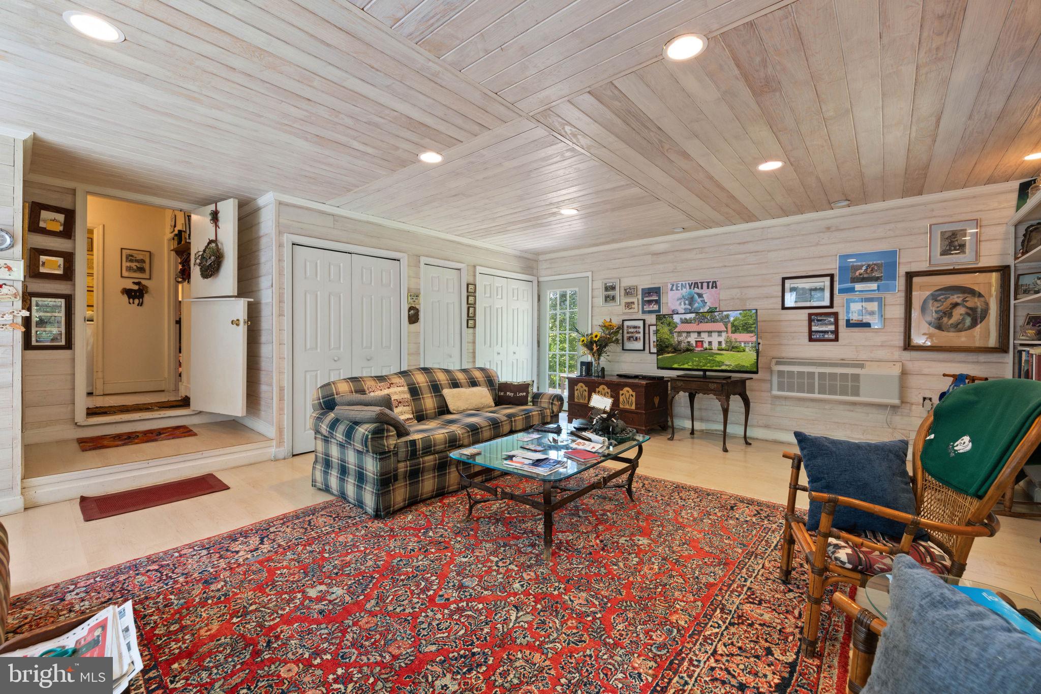 961 Summerville Road Boyce, VA 22620 - Photo 22 of 57 a living room with furniture and wooden floor