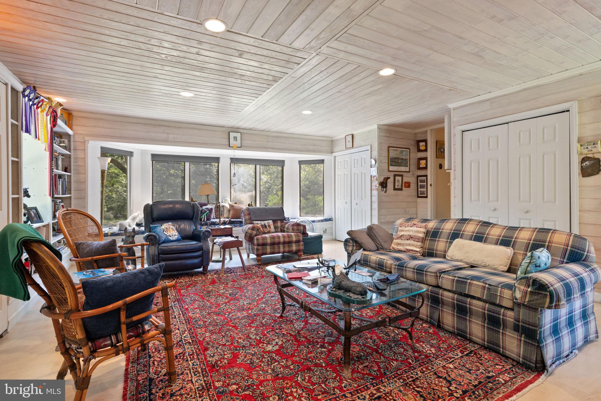961 Summerville Road Boyce, VA 22620 - Photo 23 of 57 a living room with furniture a rug and a window