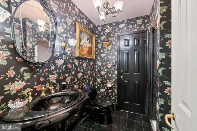 a living room with furniture rug and window