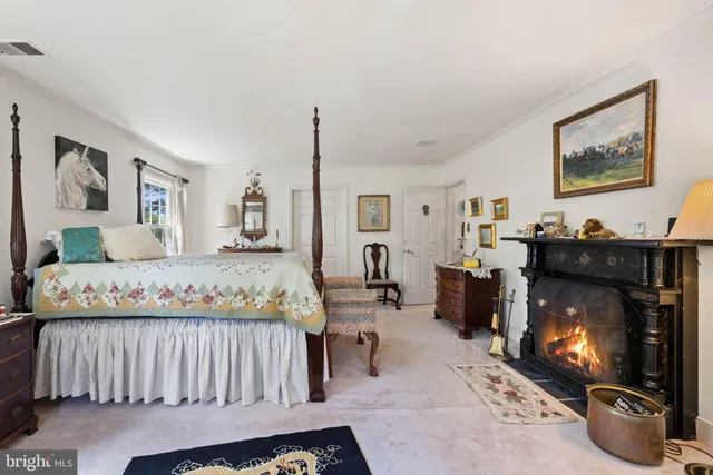 a bed room with a bed and a television