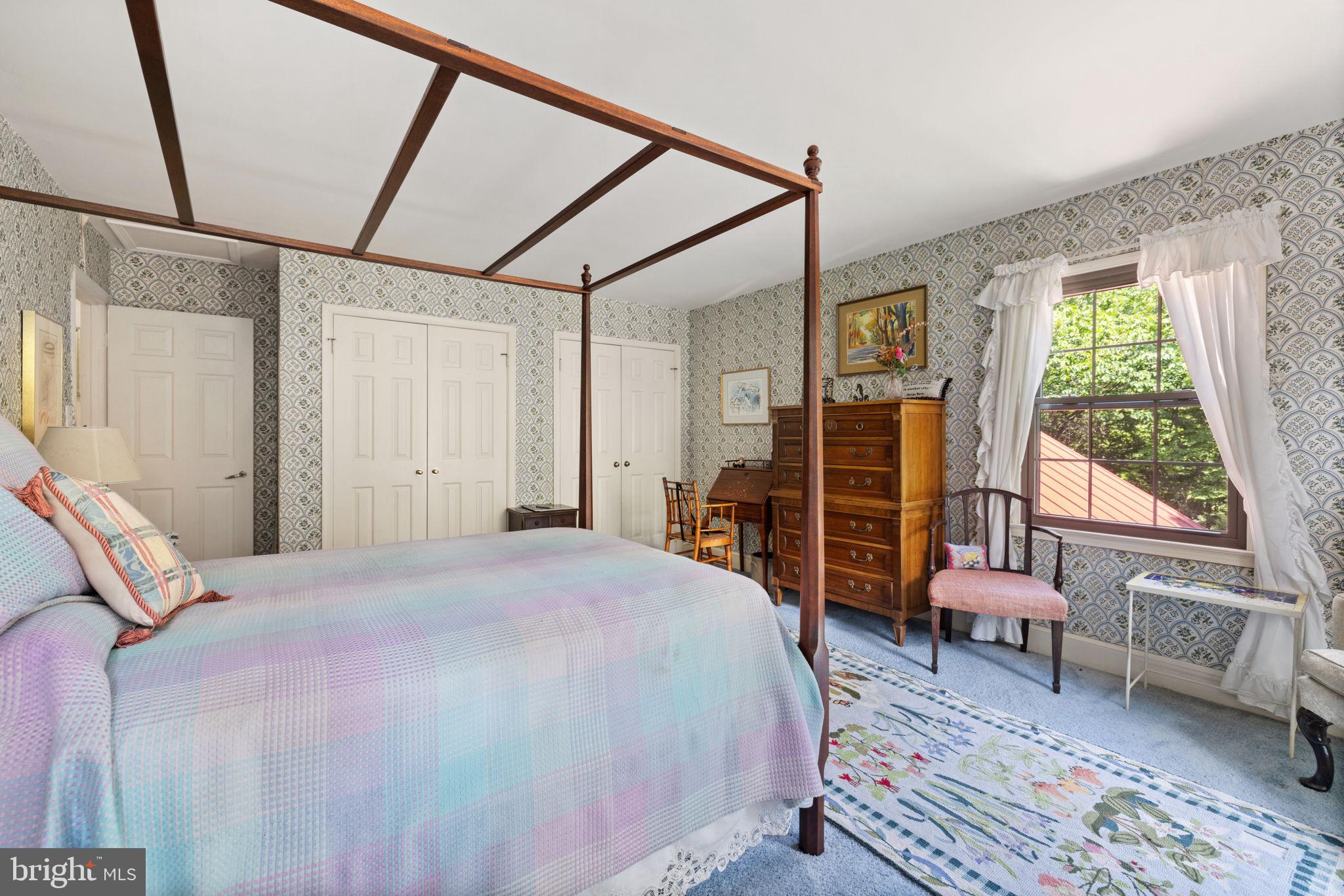 961 Summerville Road Boyce, VA 22620 - Photo 34 of 57 a bedroom with a bed and a large window