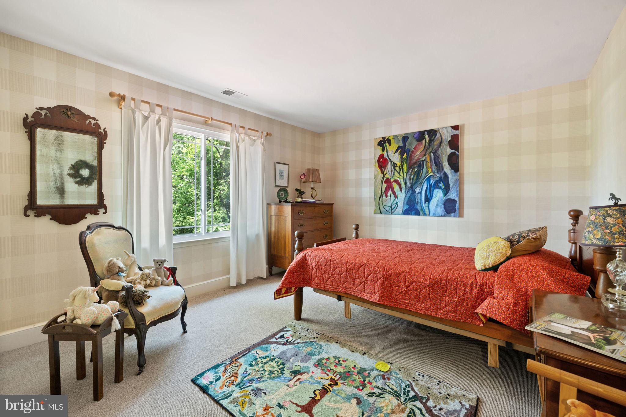 961 Summerville Road Boyce, VA 22620 - Photo 36 of 57 a bed room with a bed and a chair