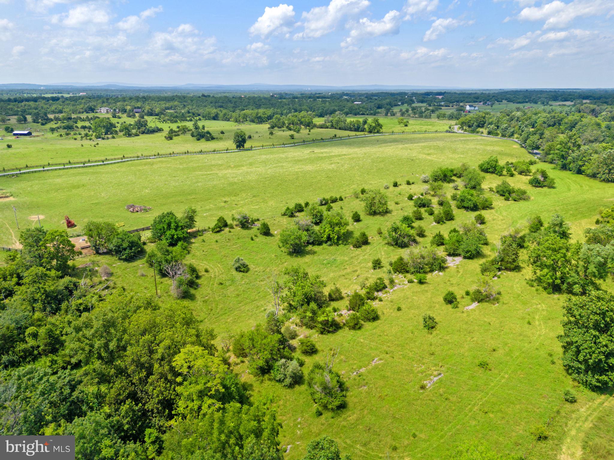 961 Summerville Road Boyce, VA 22620 - Photo 54 of 57 a view of a field with an ocean