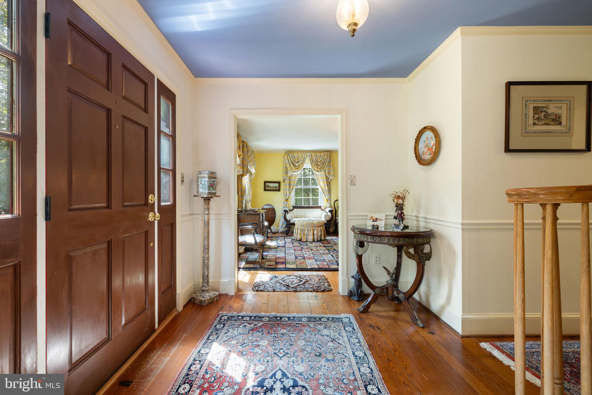 961 Summerville Road Boyce, VA 22620 - Photo 8 of 57 a view of a hallway with living room and furniture