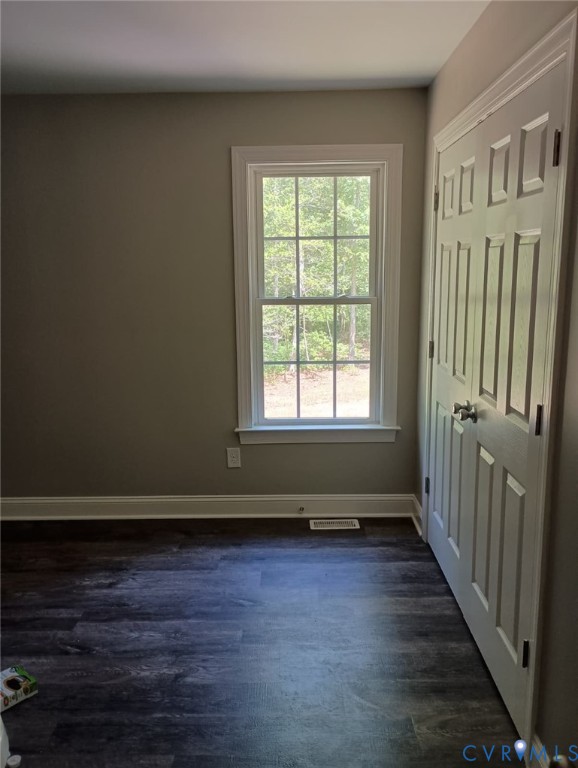 741 Grapevine Road Sandston, VA 23150 - Photo 13 of 16 a view of a room with wooden floor and a window