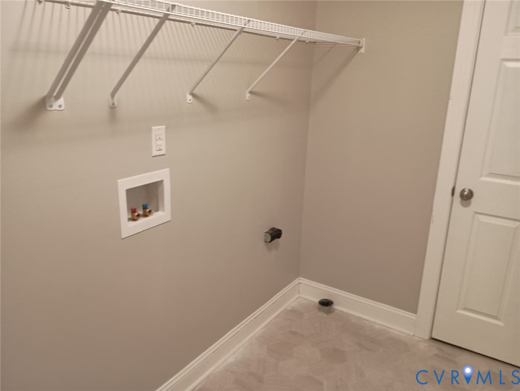 741 Grapevine Road Sandston, VA 23150 - Photo 15 of 16 a bathroom with a shower and a shower head