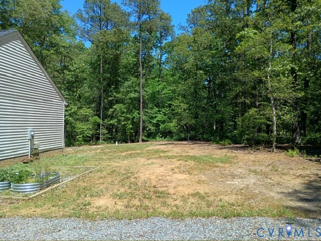 741 Grapevine Road Sandston, VA 23150 - Photo 3 of 16 a view of a yard with a house
