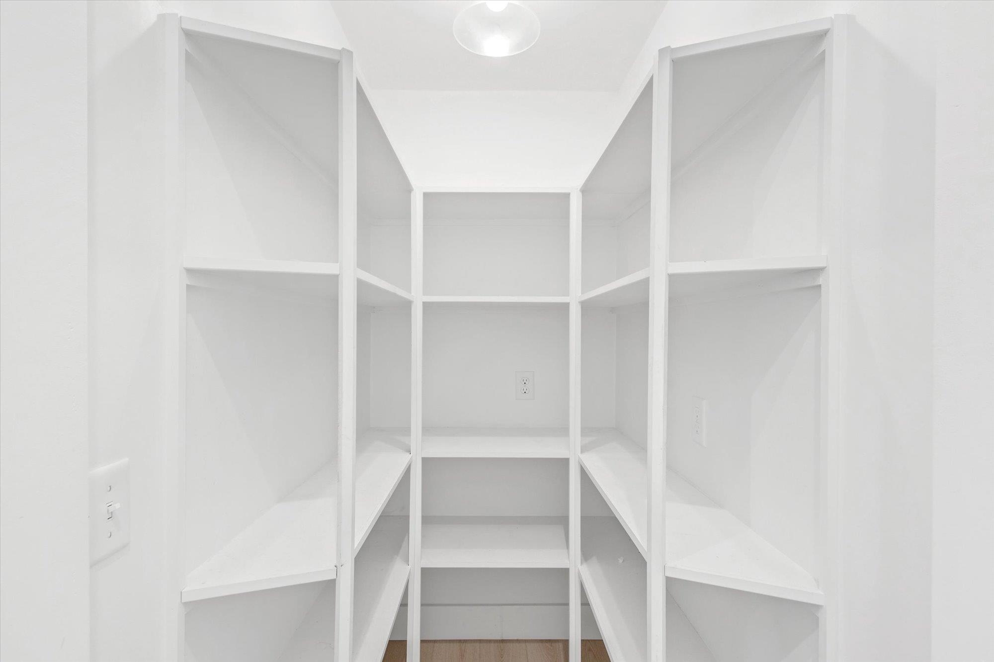 330 Biscayne Avenue St. Augustine, FL 32080 - Photo 13 of 49 a view of walk in closet with empty racks