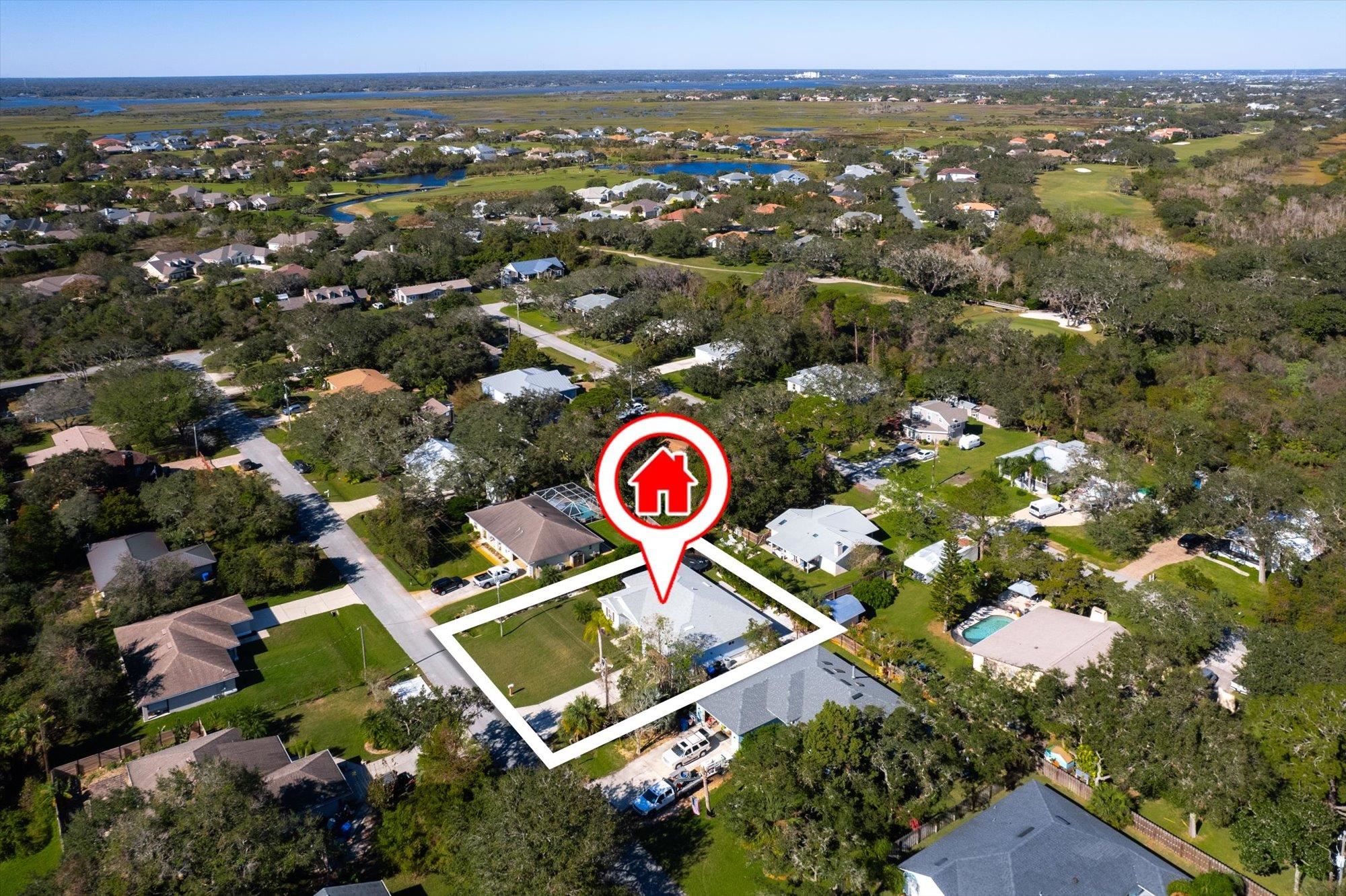 330 Biscayne Avenue St. Augustine, FL 32080 - Photo 38 of 49 an aerial view of residential house with parking and trees