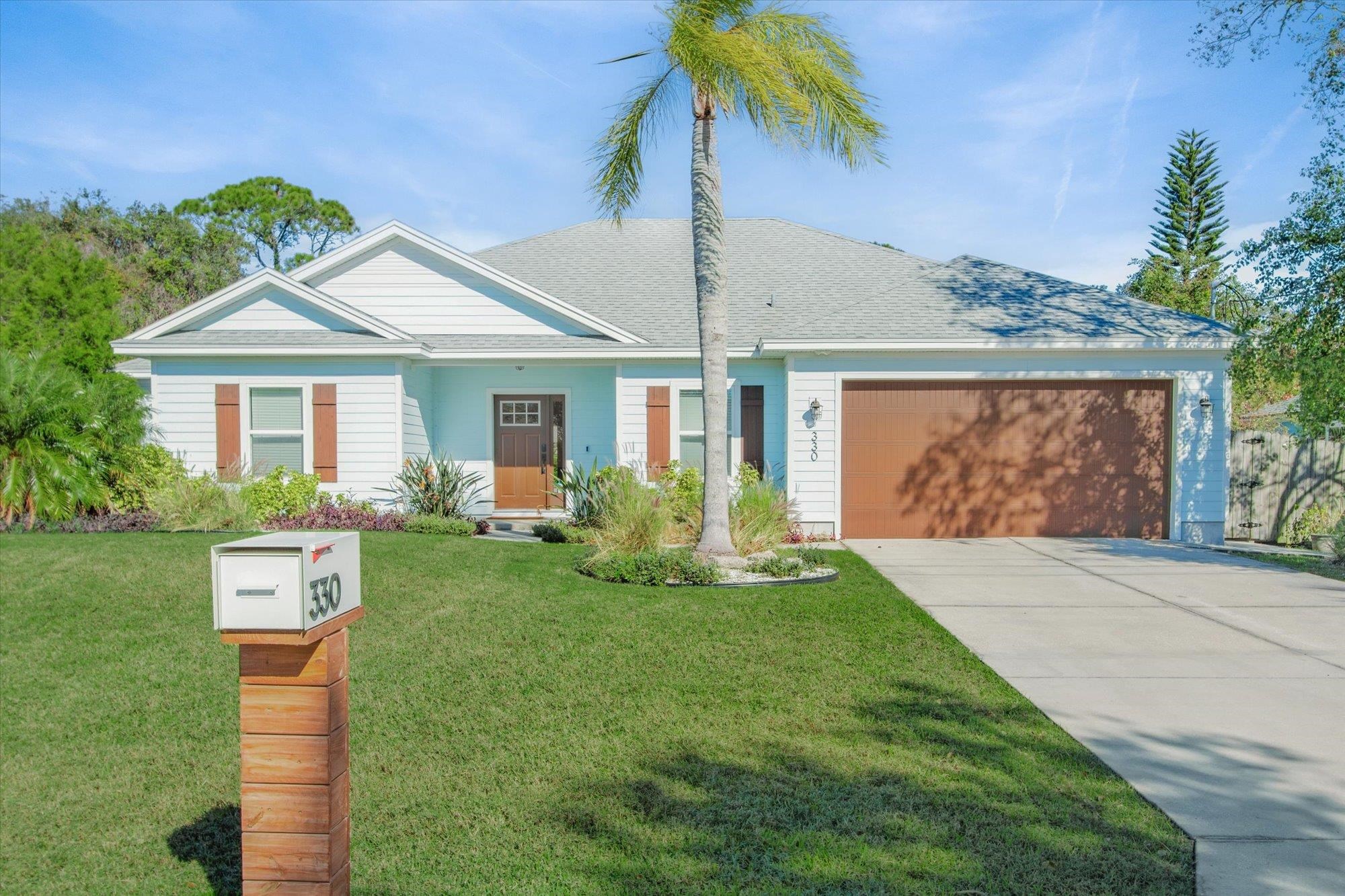 330 Biscayne Avenue St. Augustine, FL 32080 - Photo 49 of 49 a front view of a house with garden