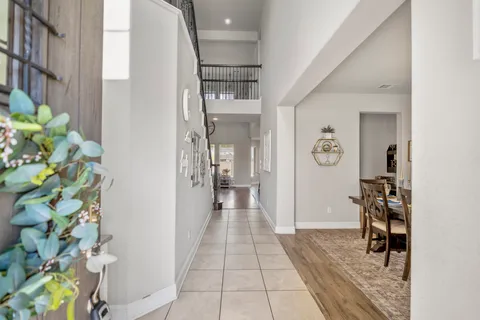 a balcony view with a seating space