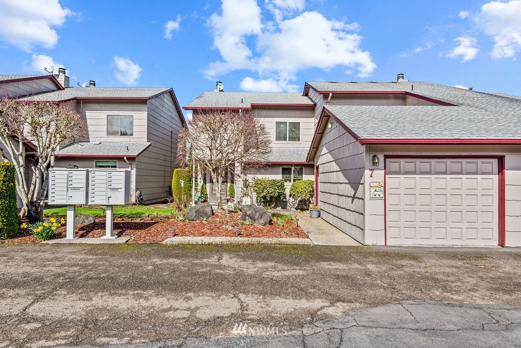2363 40th Avenue, Unit 7 Longview, WA 98632 - Photo 1 of 25 a view of a house with a patio