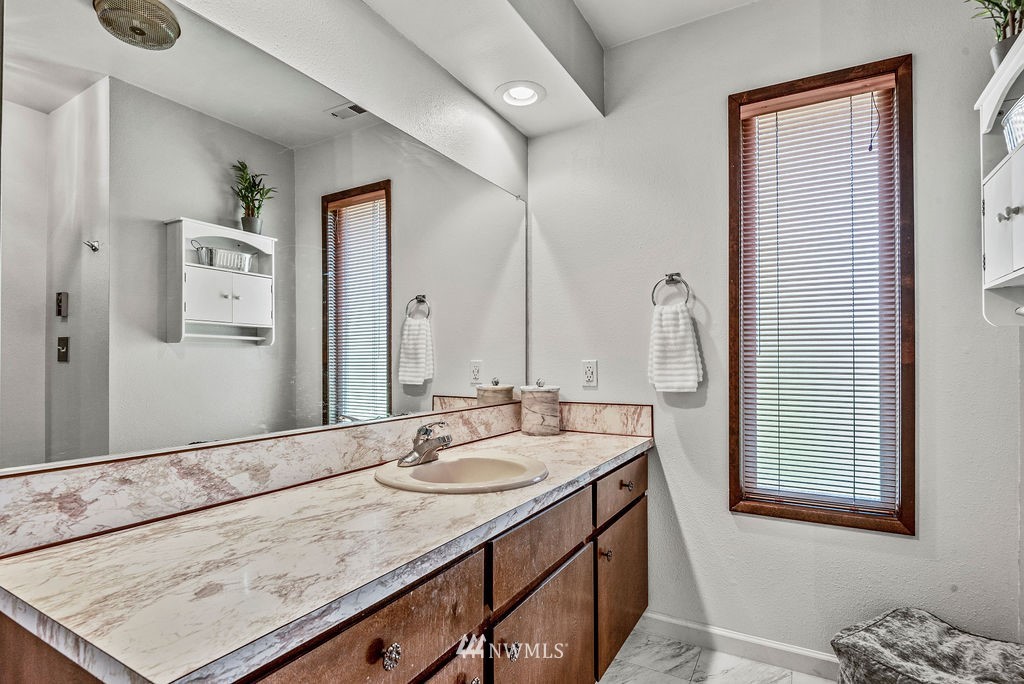 2363 40th Avenue, Unit 7 Longview, WA 98632 - Photo 14 of 25 a bathroom with a sink double vanity and a mirror