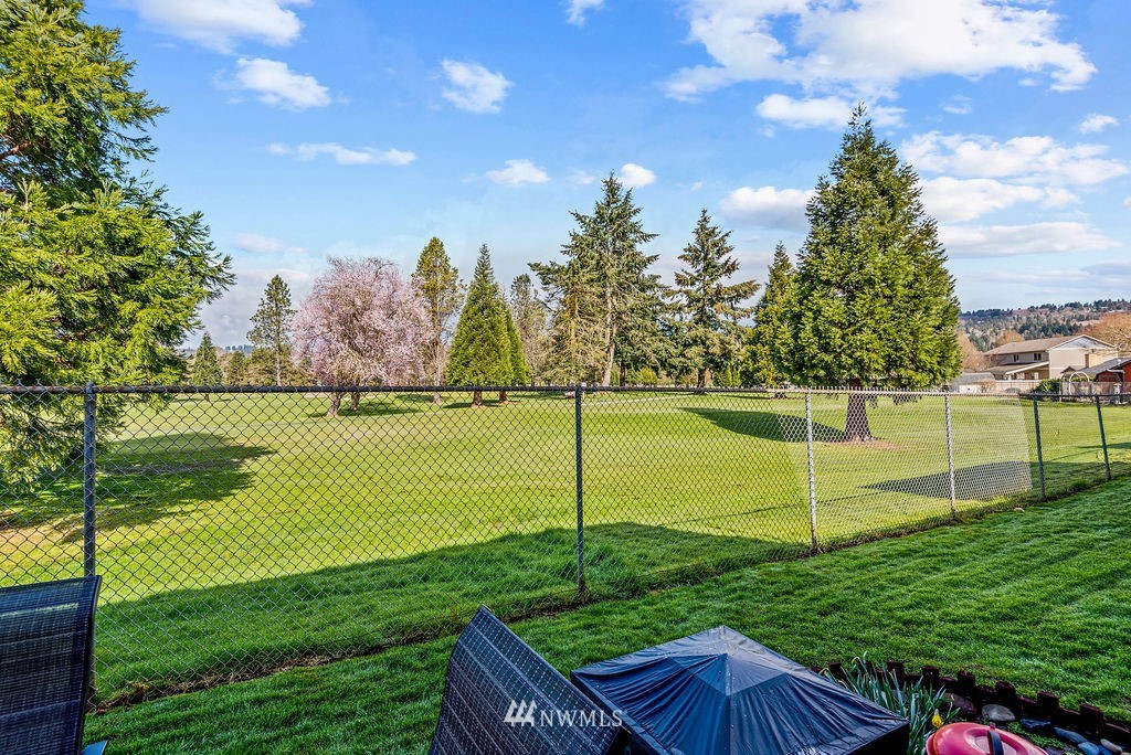 2363 40th Avenue, Unit 7 Longview, WA 98632 - Photo 20 of 25 a view of a backyard with a garden