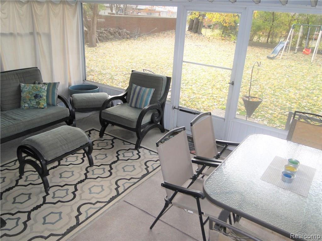2049 Walton Blvd. Rochester, MI 48309 - Photo 38 of 41 Screened-in Patio - Room for seating and table