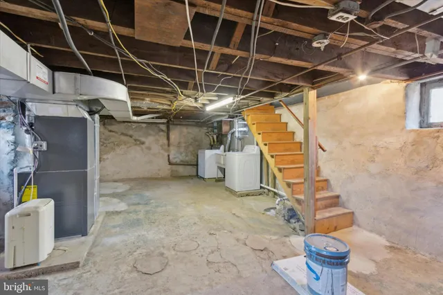 a view of a storage room with racks on the wall
