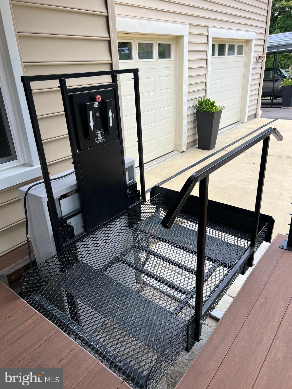 24515 Ridge Road Damascus, MD 20872 - Photo 44 of 53 Chair lift. Main level accessible w/ no stairs.
