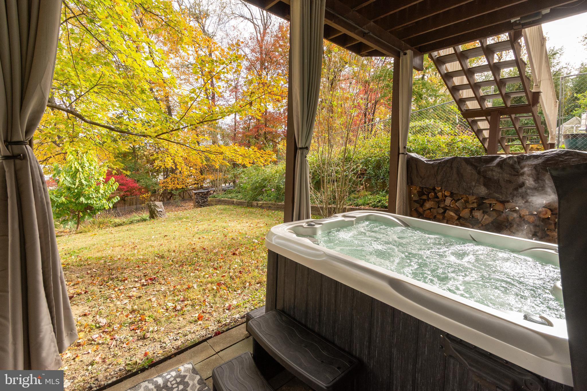 24515 Ridge Road Damascus, MD 20872 - Photo 50 of 53 Hot Tub with privacy curtains. Your private oasis.