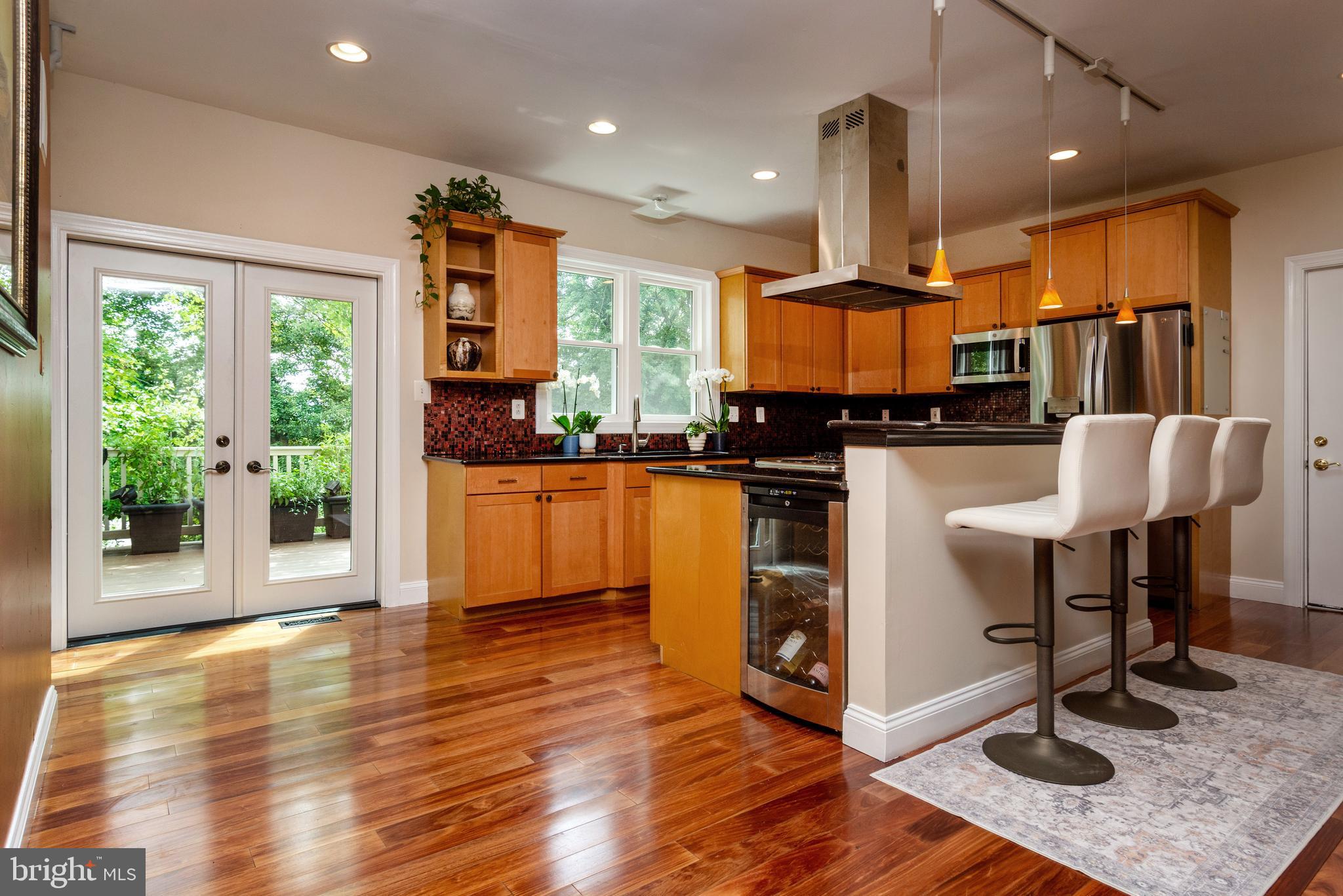 24515 Ridge Road Damascus, MD 20872 - Photo 8 of 53 Kitchen w/ french doors leading to expansive deck