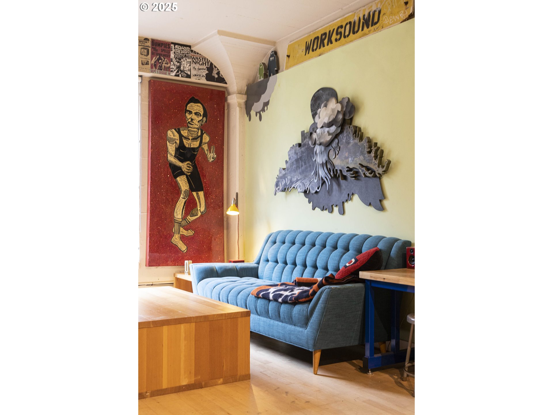 300 Northwest 8th Avenue, Unit 401 Portland, OR 97209 - Photo 21 of 37 a living room with furniture and a wall painting