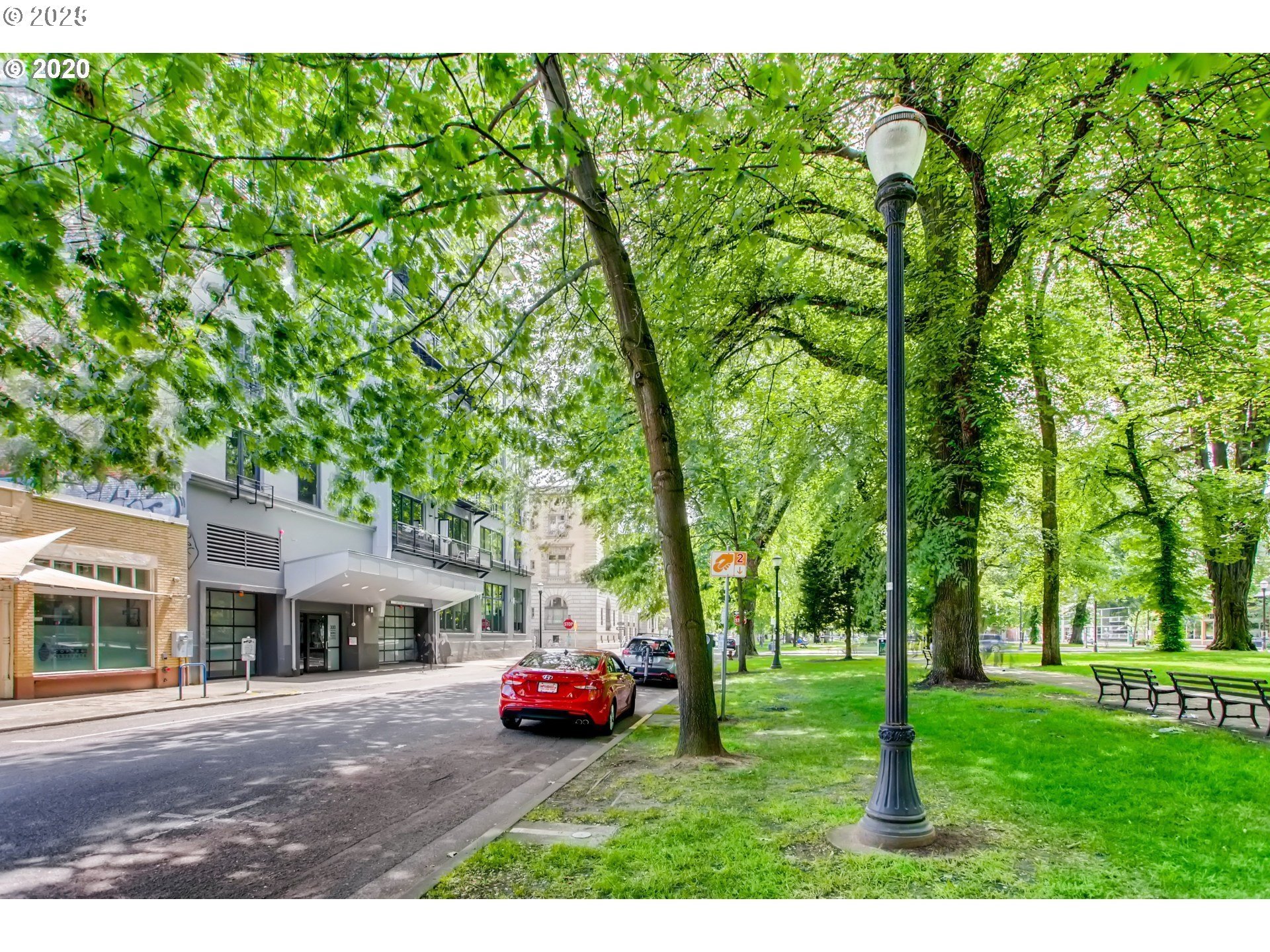 300 Northwest 8th Avenue, Unit 401 Portland, OR 97209 - Photo 26 of 37 a view of a yard with plants and trees