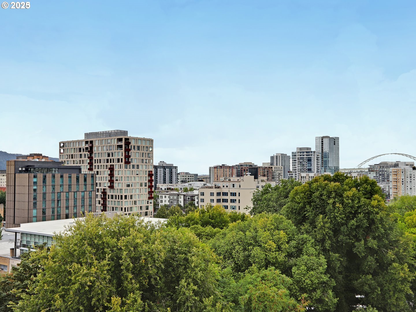 300 Northwest 8th Avenue, Unit 401 Portland, OR 97209 - Photo 31 of 37 a view of a city with tall buildings in the background