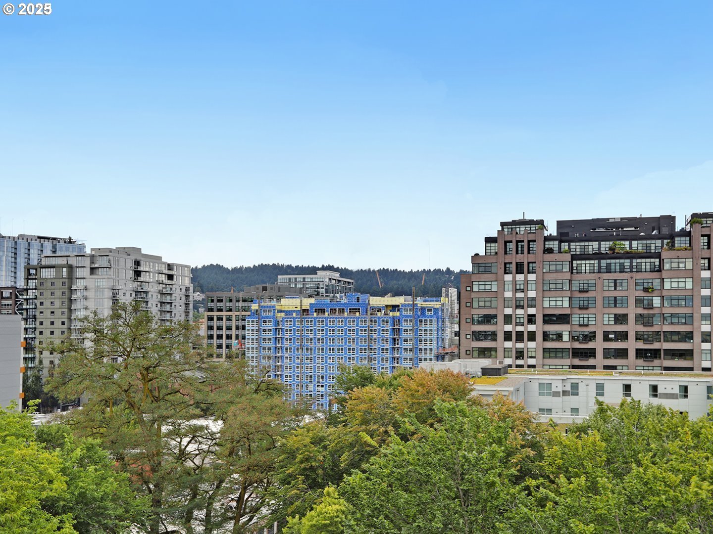 300 Northwest 8th Avenue, Unit 401 Portland, OR 97209 - Photo 32 of 37 a view of a city with tall buildings