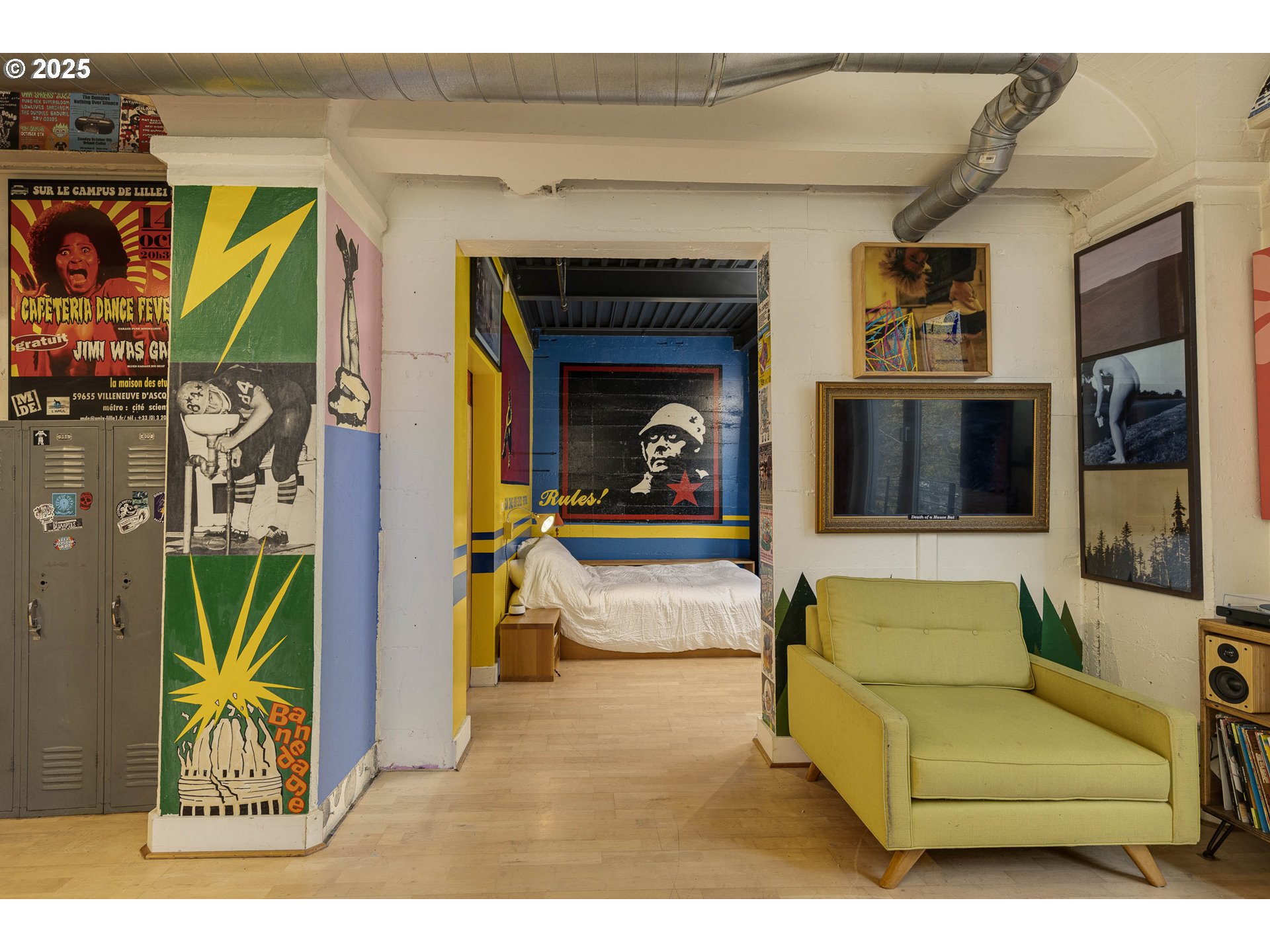 300 Northwest 8th Avenue, Unit 401 Portland, OR 97209 - Photo 6 of 37 a living room with furniture and a fireplace