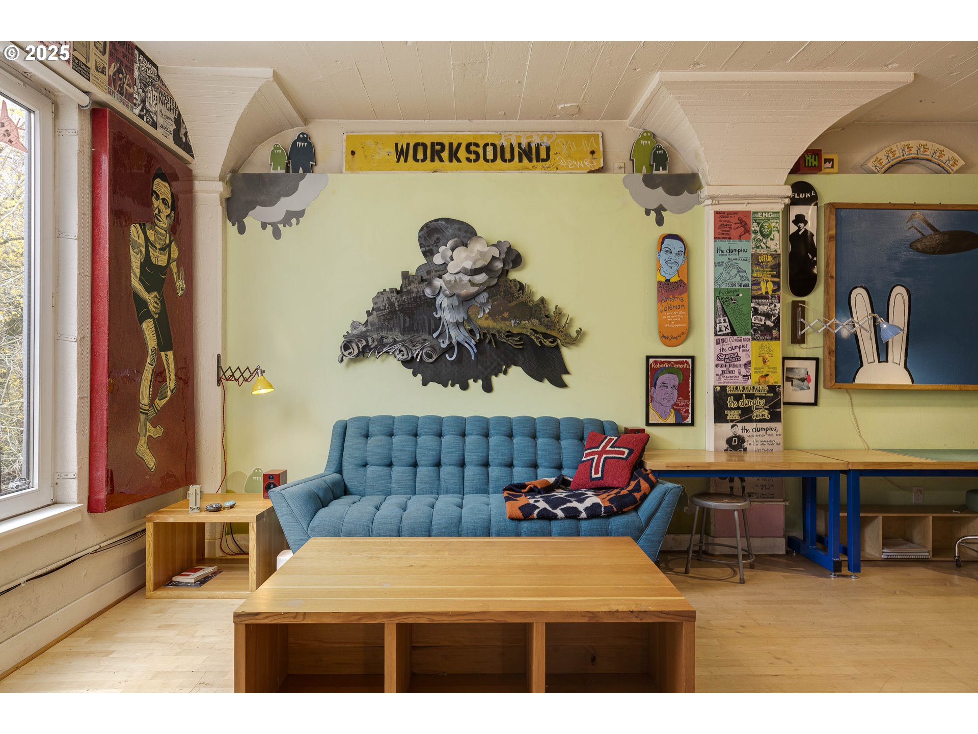 300 Northwest 8th Avenue, Unit 401 Portland, OR 97209 - Photo 10 of 37 a bedroom with a bed and a couch