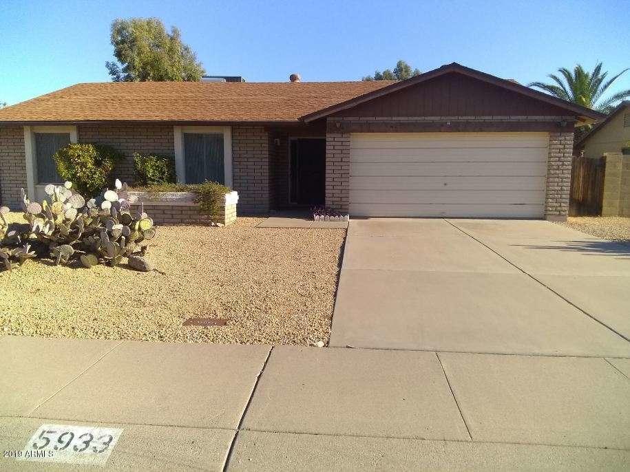 5933 East Spring Road Scottsdale, AZ 85254 - Photo 2 of 23 a front view of house along with residential houses