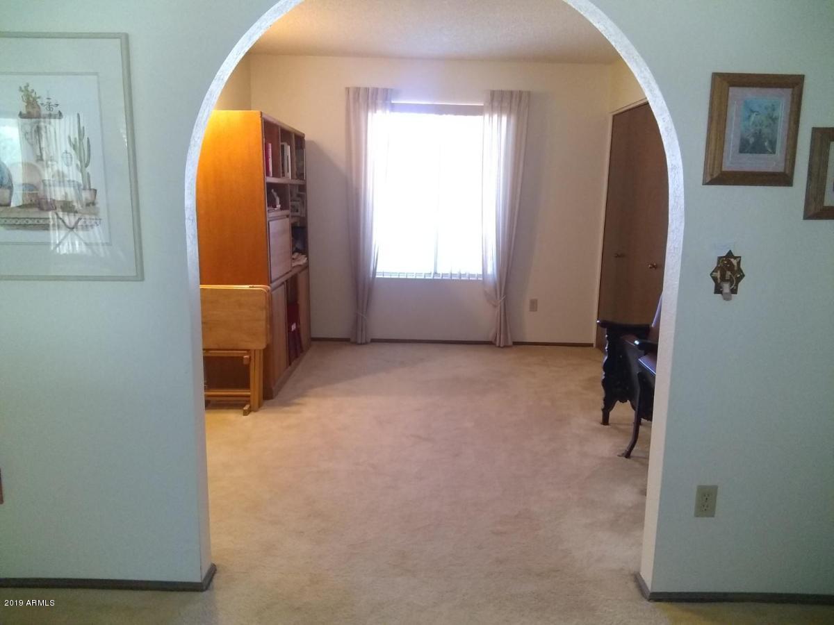5933 East Spring Road Scottsdale, AZ 85254 - Photo 6 of 23 a view of a room with closet and mirror