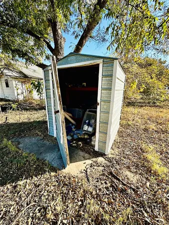a view of a porch with a fireplace
