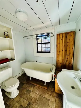 a bathroom with a sink and a bathtub