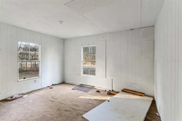 a room with a table and a chair