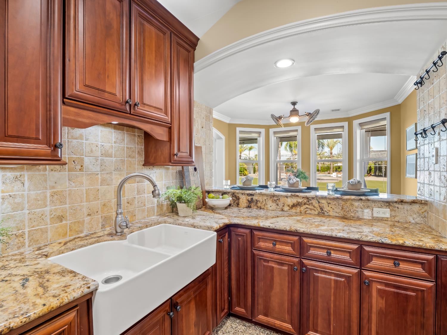 17113 Mark Road Madera, CA 93636 - Photo 26 of 99 a kitchen with a sink and cabinets
