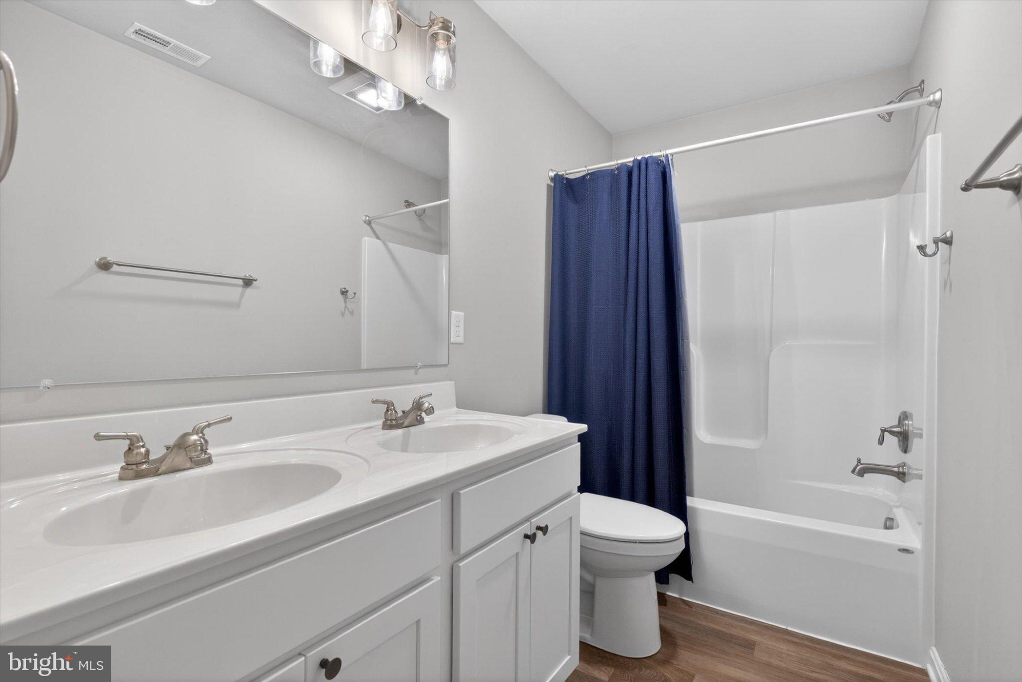 255 Kinneman Road Abbottstown, PA 17301 - Photo 22 of 39 Modern bathroom with dual sinks.
