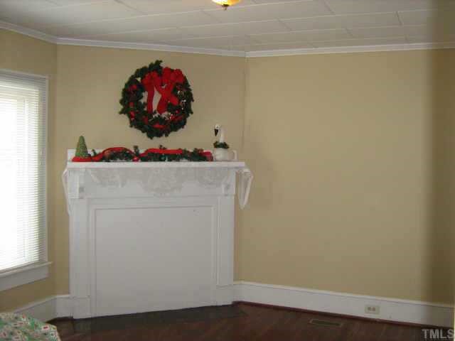 3801 Pleasant Green Road Durham, NC 27705 - Photo 3 of 12 LIVING ROOM HAS HARDWOODS & A FIREPLACE