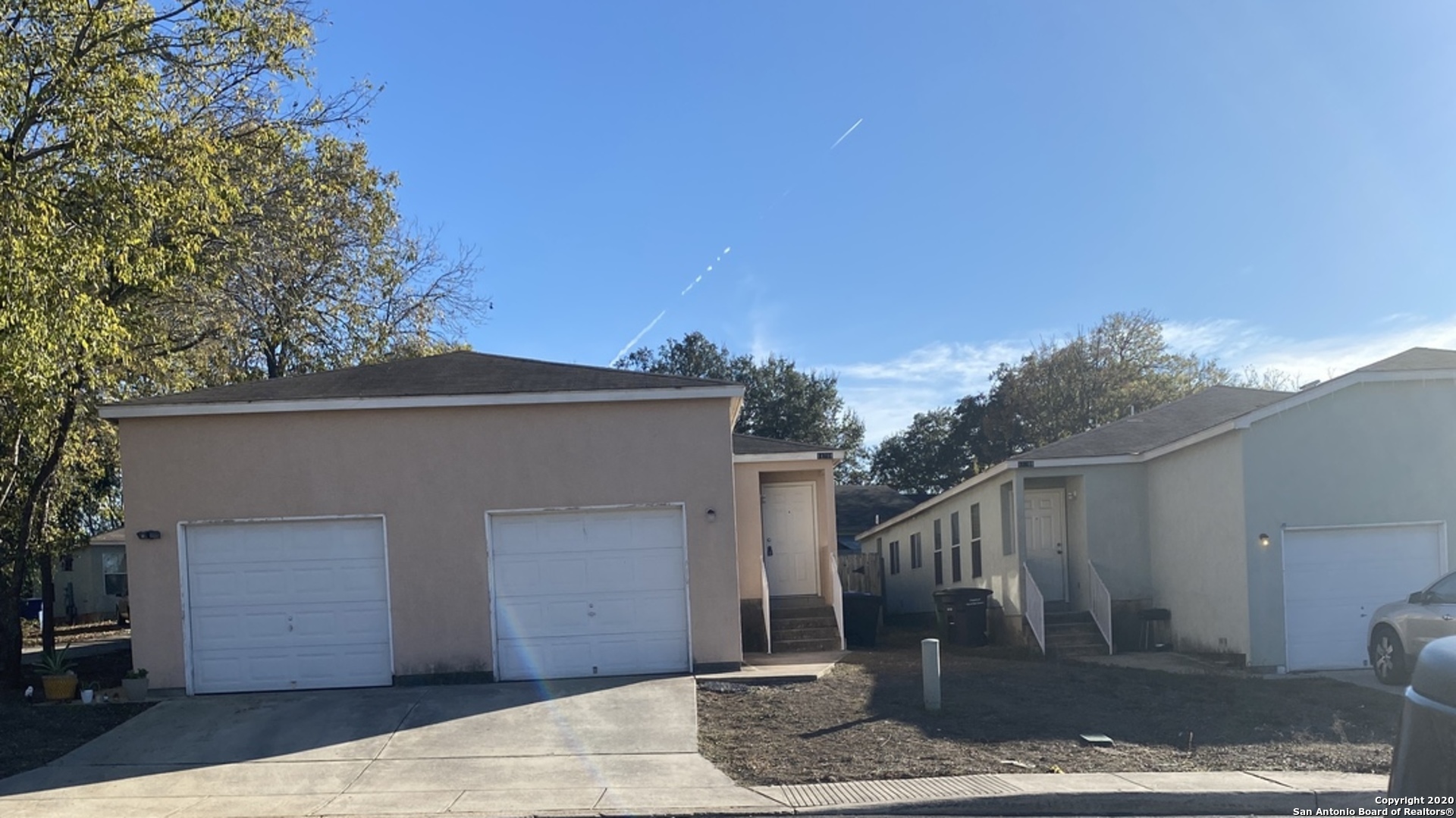 11220 Center Point Road San Antonio, TX 78233 - Photo 2 of 15 a front view of a house with garden
