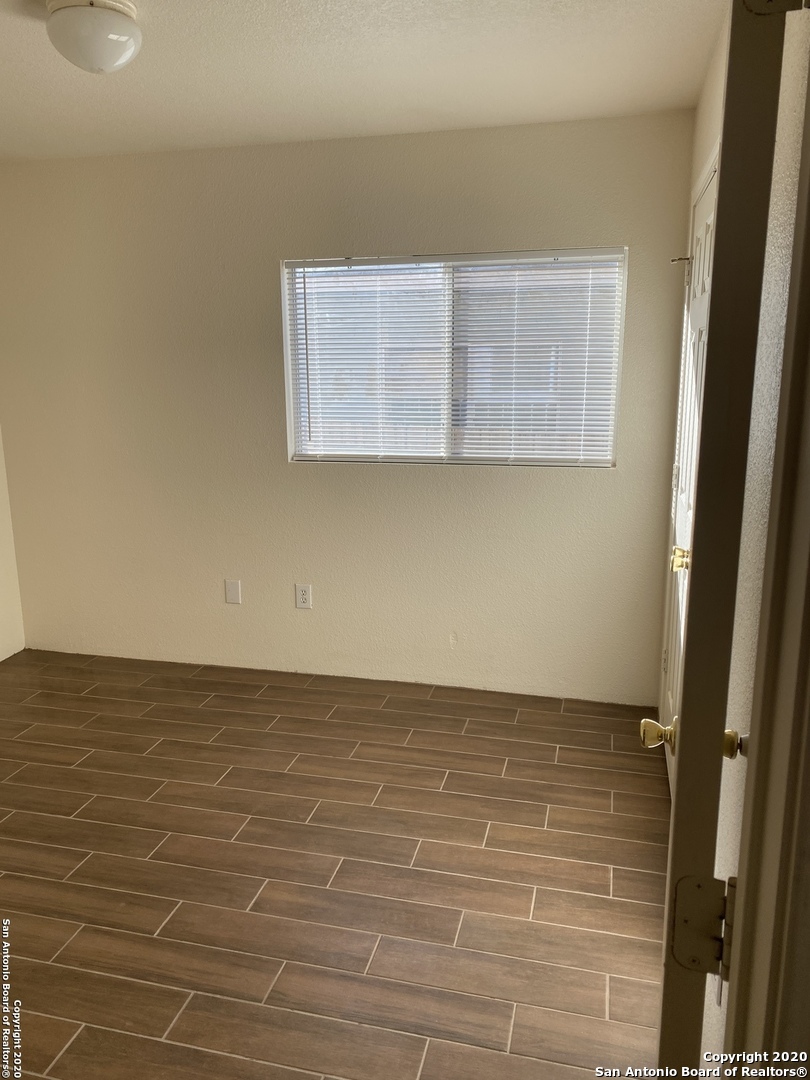 11220 Center Point Road San Antonio, TX 78233 - Photo 8 of 15 a view of wooden floor
