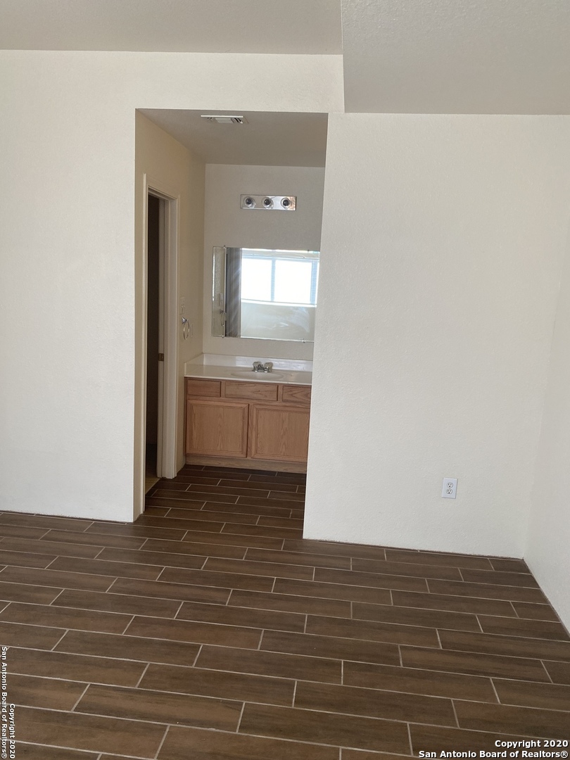 11220 Center Point Road San Antonio, TX 78233 - Photo 10 of 15 a view of kitchen and empty room