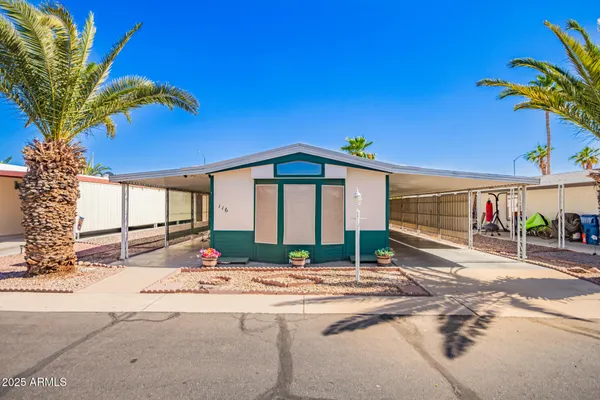 a front view of a building with street view