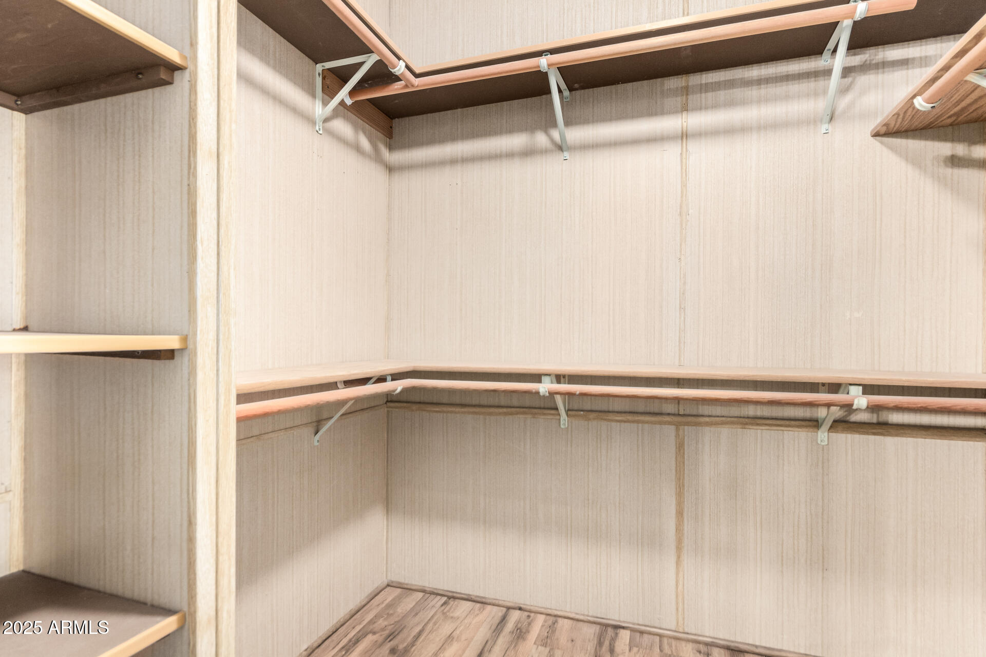 834 South Meridian Road, Unit 116 Apache Junction, AZ 85120 - Photo 21 of 42 a view of a room with racks on the wall