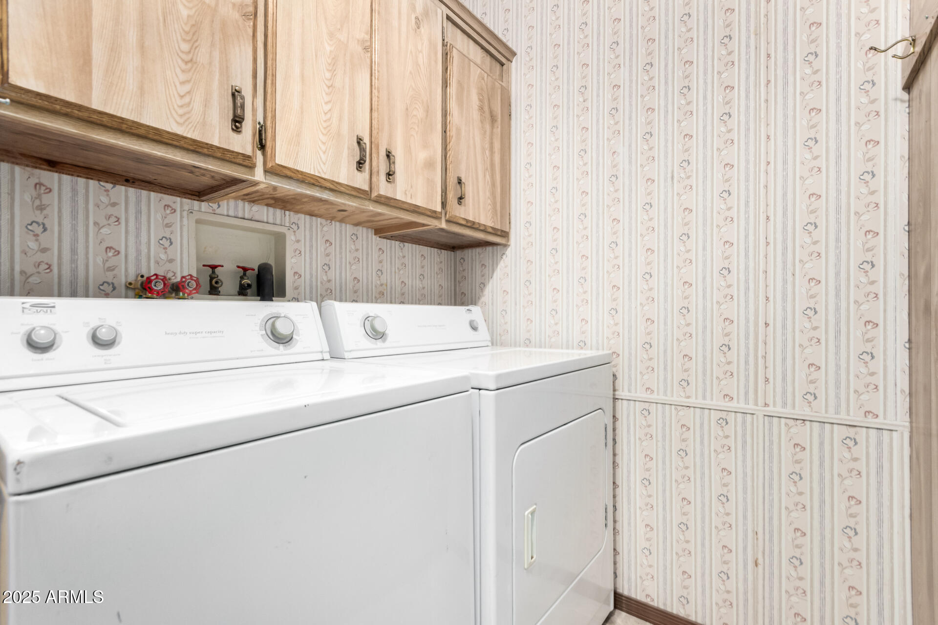 834 South Meridian Road, Unit 116 Apache Junction, AZ 85120 - Photo 27 of 42 a view of cabinets with wooden floor