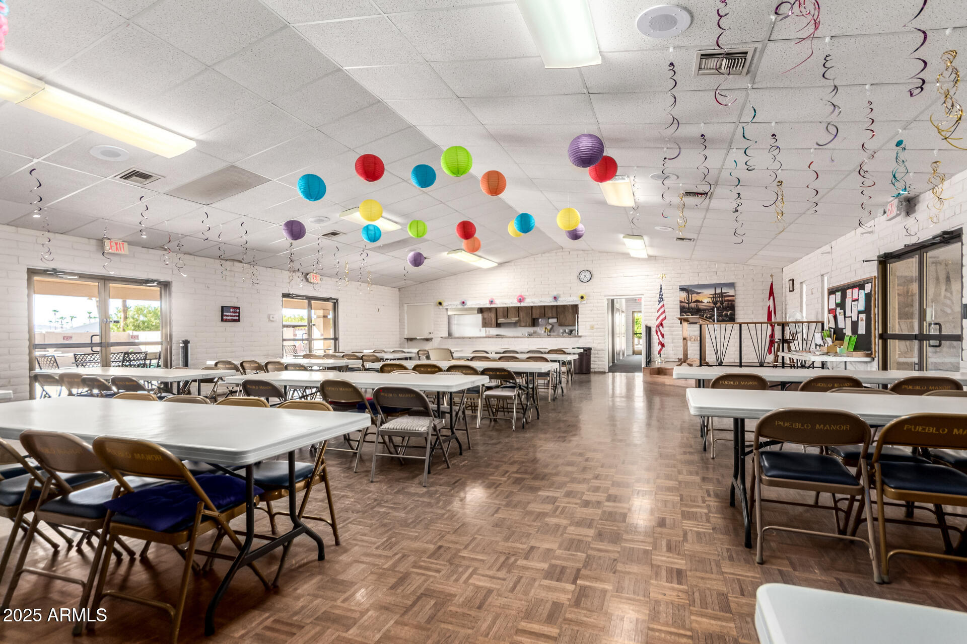 834 South Meridian Road, Unit 116 Apache Junction, AZ 85120 - Photo 30 of 42 a group of people sitting at tables in a room
