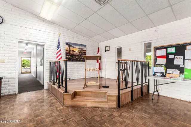 a dining room with a wooden floor and breakfast area