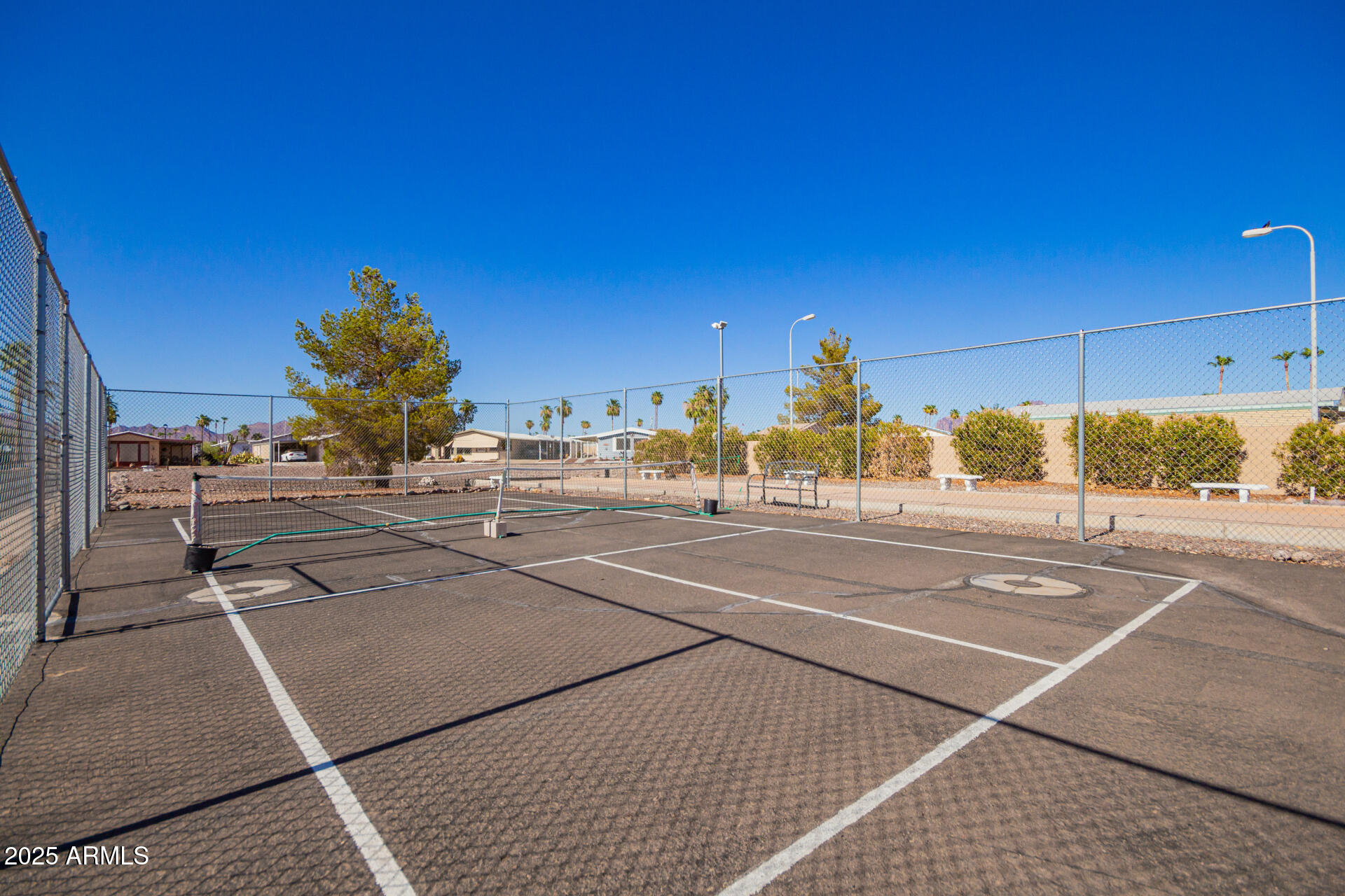 834 South Meridian Road, Unit 116 Apache Junction, AZ 85120 - Photo 34 of 42 a view of a tennis court