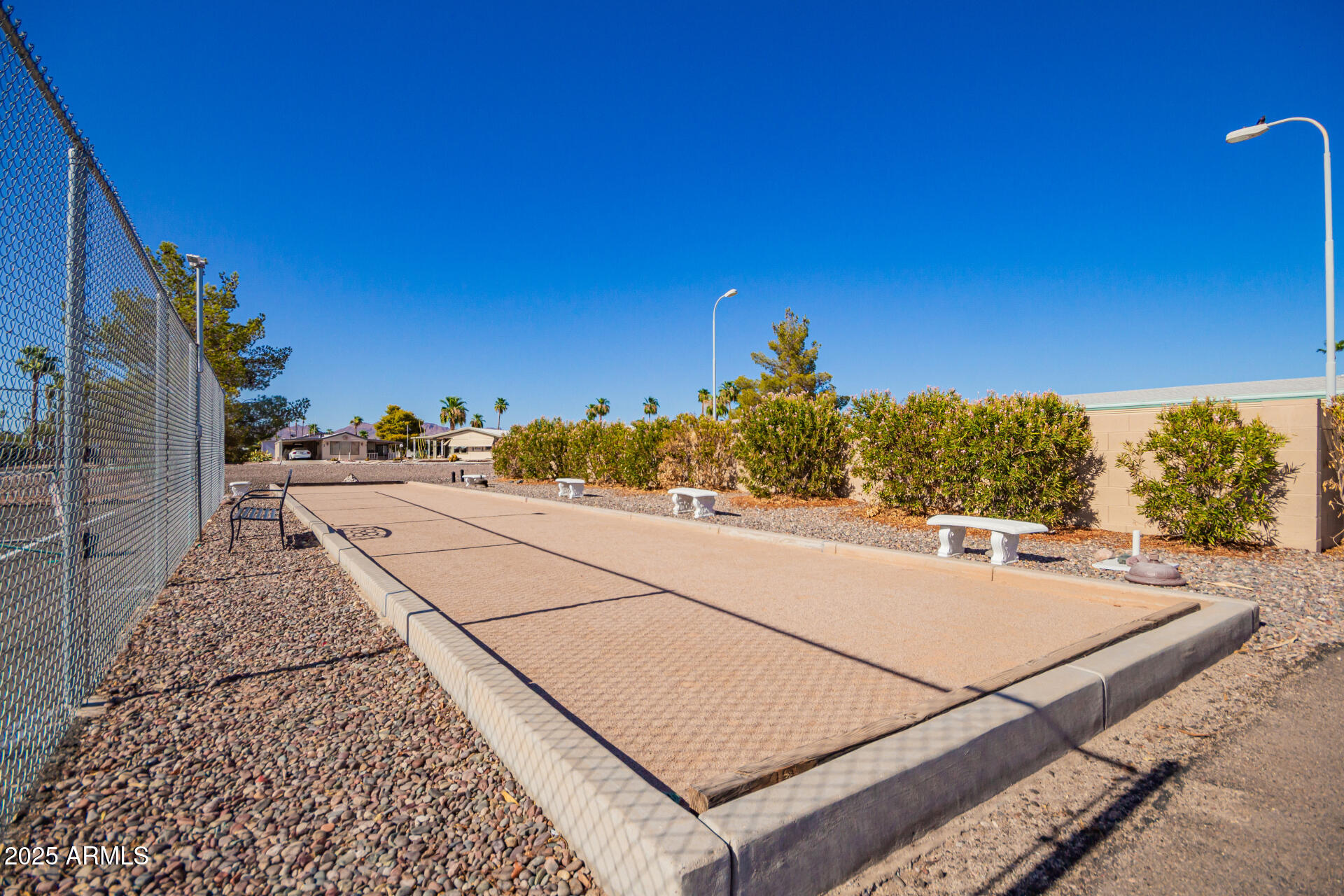 834 South Meridian Road, Unit 116 Apache Junction, AZ 85120 - Photo 35 of 42 a view of a terrace with a yard