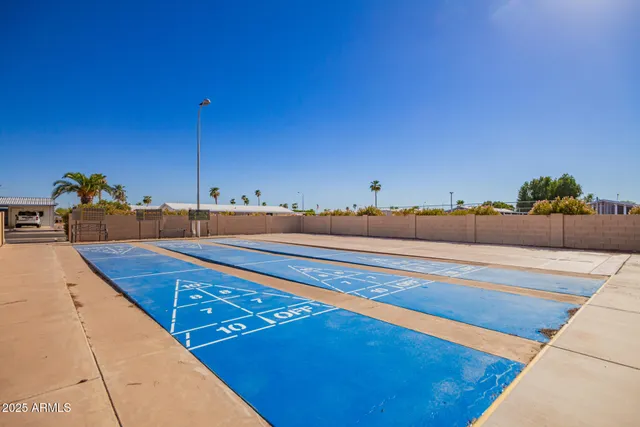 a view of swimming pool with outdoor seating